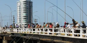 Rio Tramandaí atrai visitantes e pescadores em busca de diversão