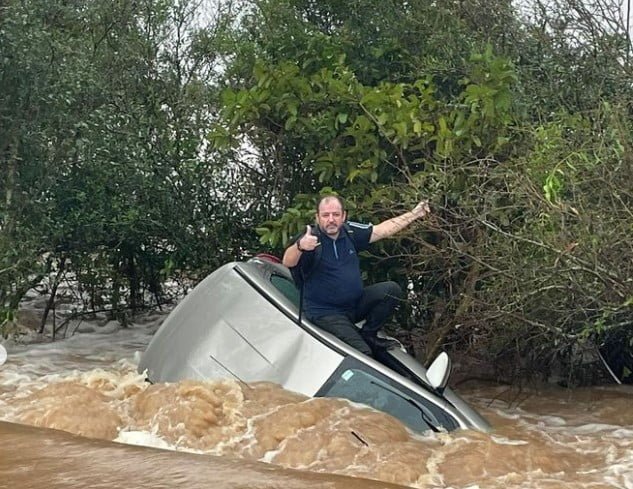 PRF de folga localiza e resgata homem arrastado pela enchente.
