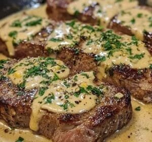 Bife com molho de creme de alho